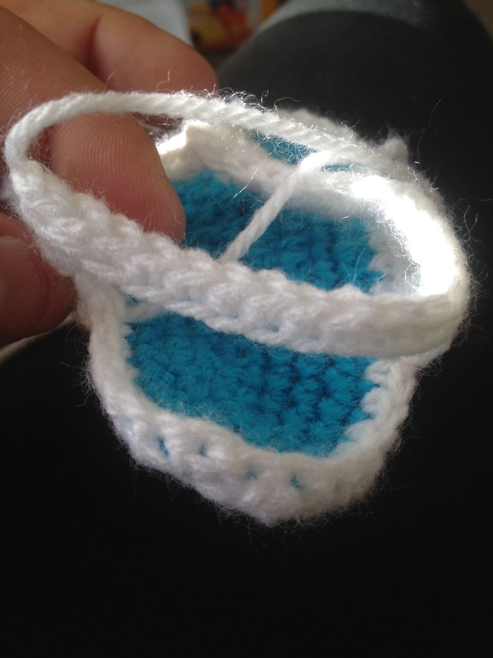 Go around and sew in a tails with your yarn needle
