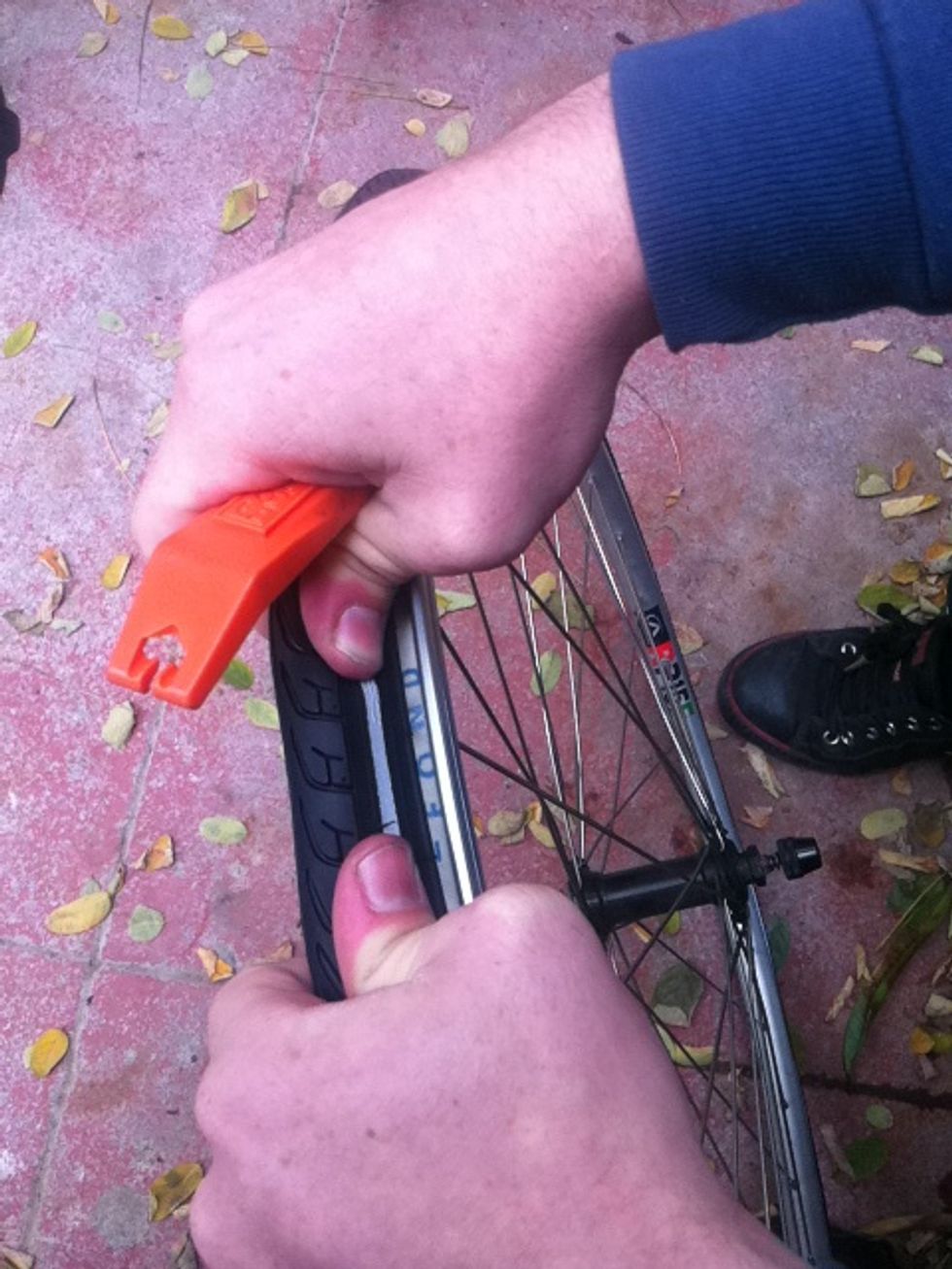 go around the tire and look to make sure the tube isn't overflowing under the tire bead. this will give you pinch flats!