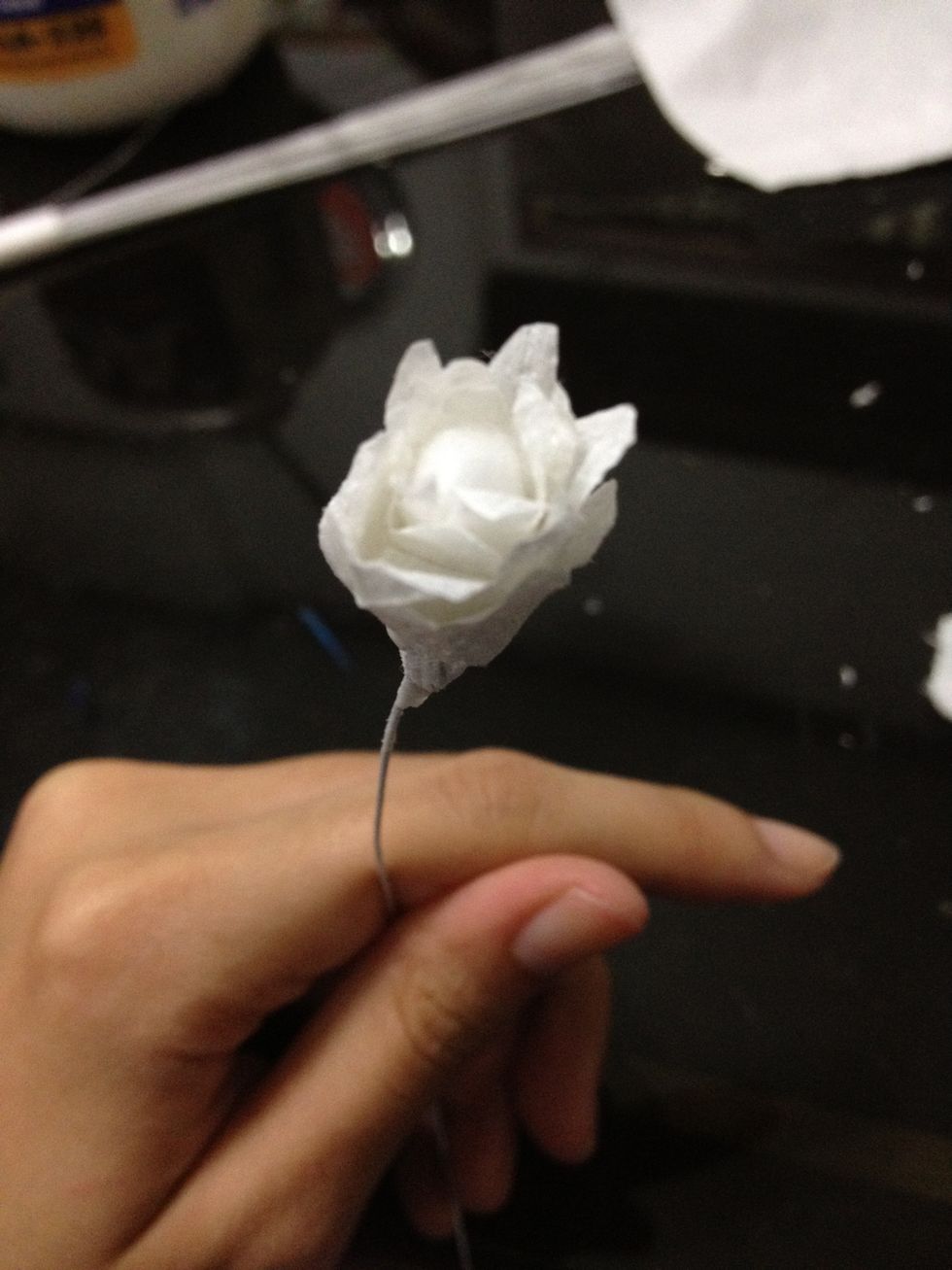 Go around the wire to make the first layer of petals.