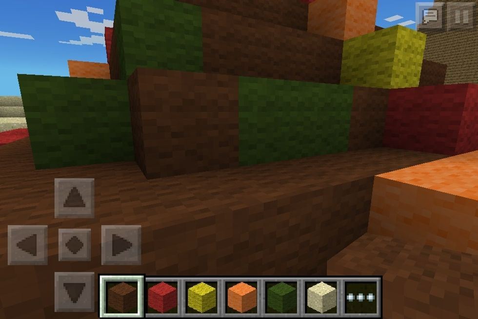 Go back and create grass patches with a dark green block