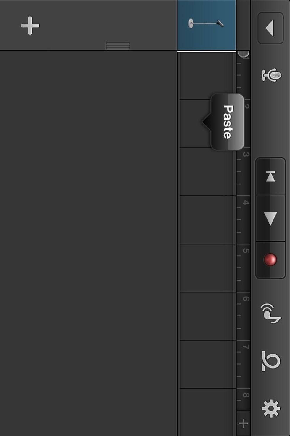Go back to your TRACKS in Garageband and make sure the playhead (the line that tells you where you are in the song) is at the beginning. Tap in the space to the right of the playhead and tap PASTE.