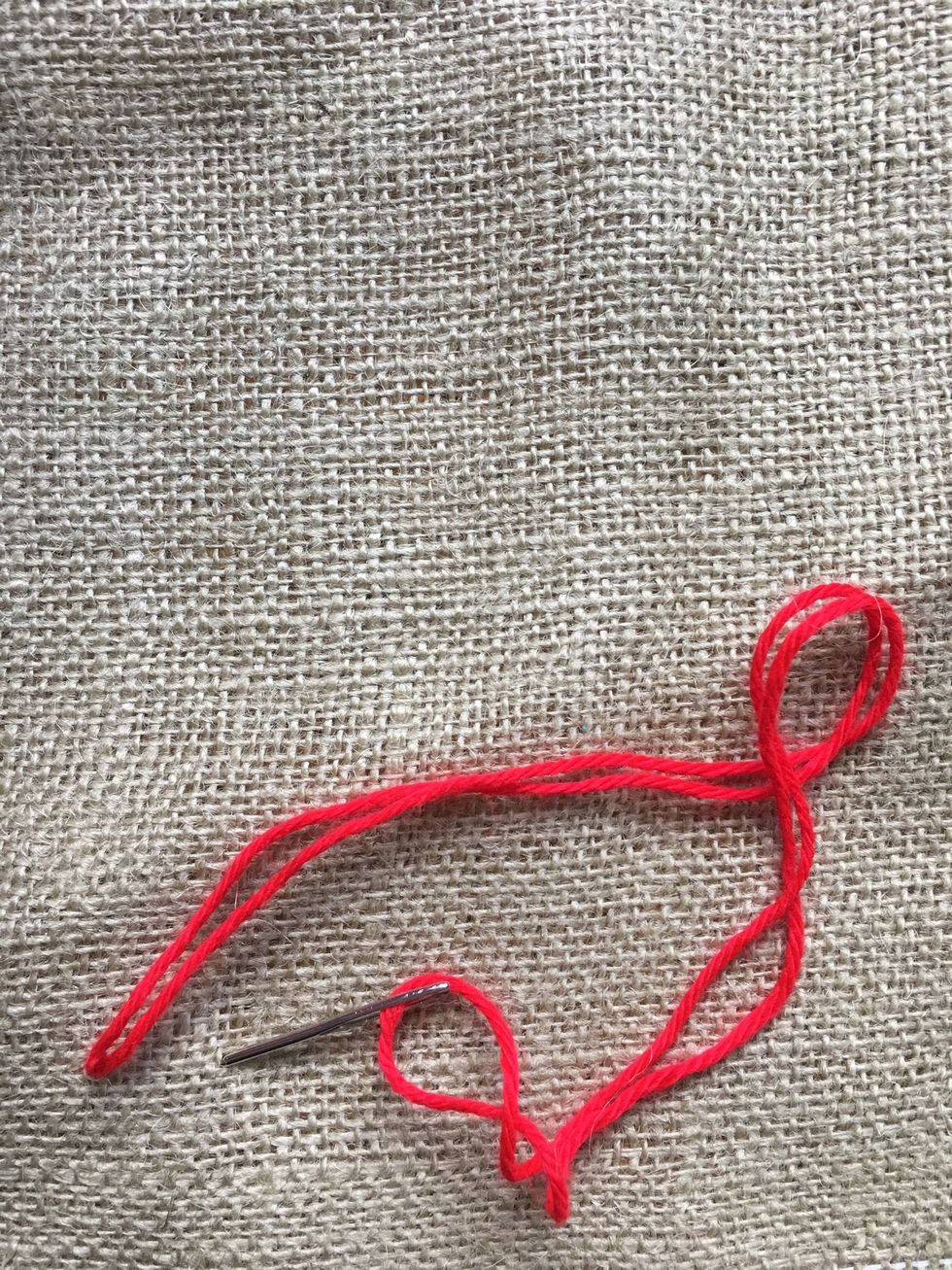 Go down through the front to make your first stitch.