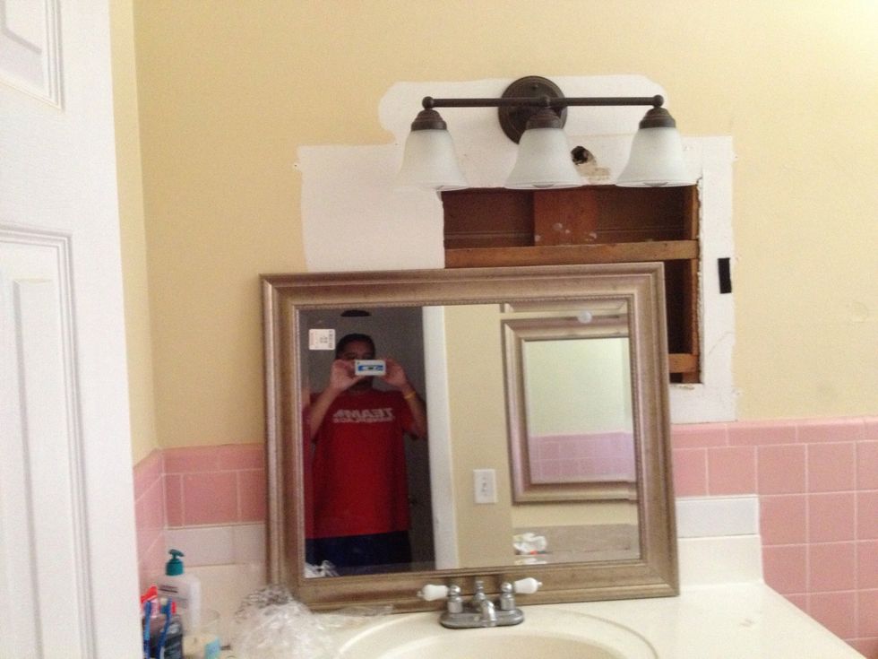 Go flip the switch in the fuse box, and then flip the light switch to make sure the light works.