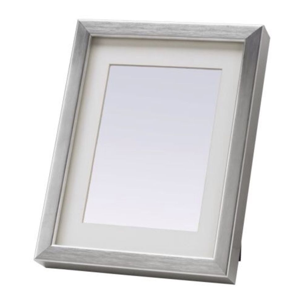 Go get a picture frame - I recommend Ribba from IKEa. It has the perfect fit for 3.5" harddrives