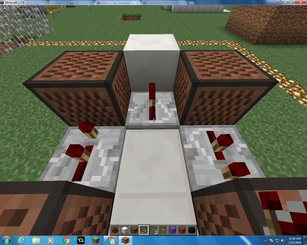 Go inside of the block that you out down before and place a Repeater. Don't right click or do anything to this Repeater. Just keep it the way it is.