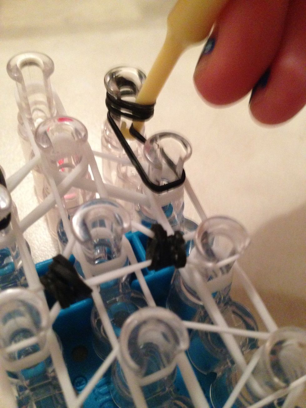 Go inside the cap band and grab these two bands