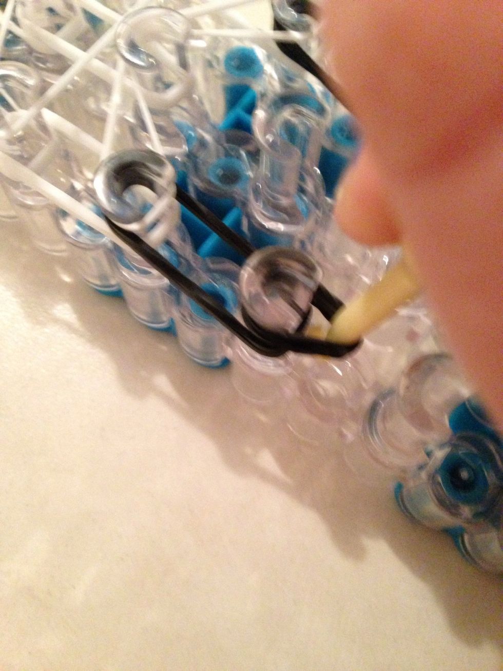 Go inside the foot cap bands and grab the leg bands