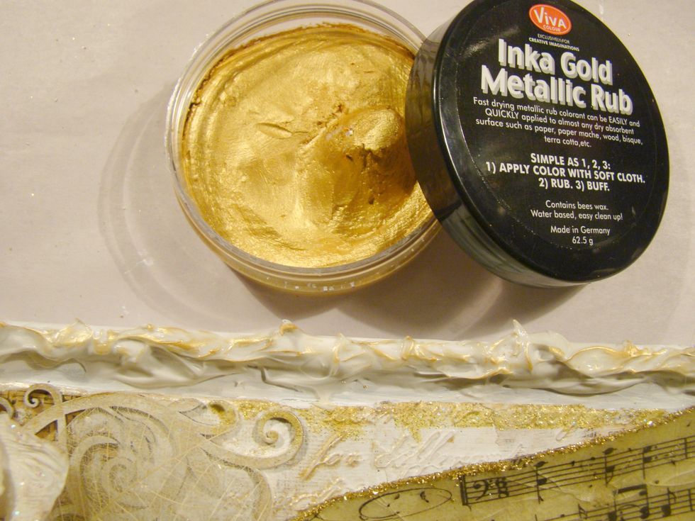 Go over the edges of your molding paste with Inka Gold for an antique look.