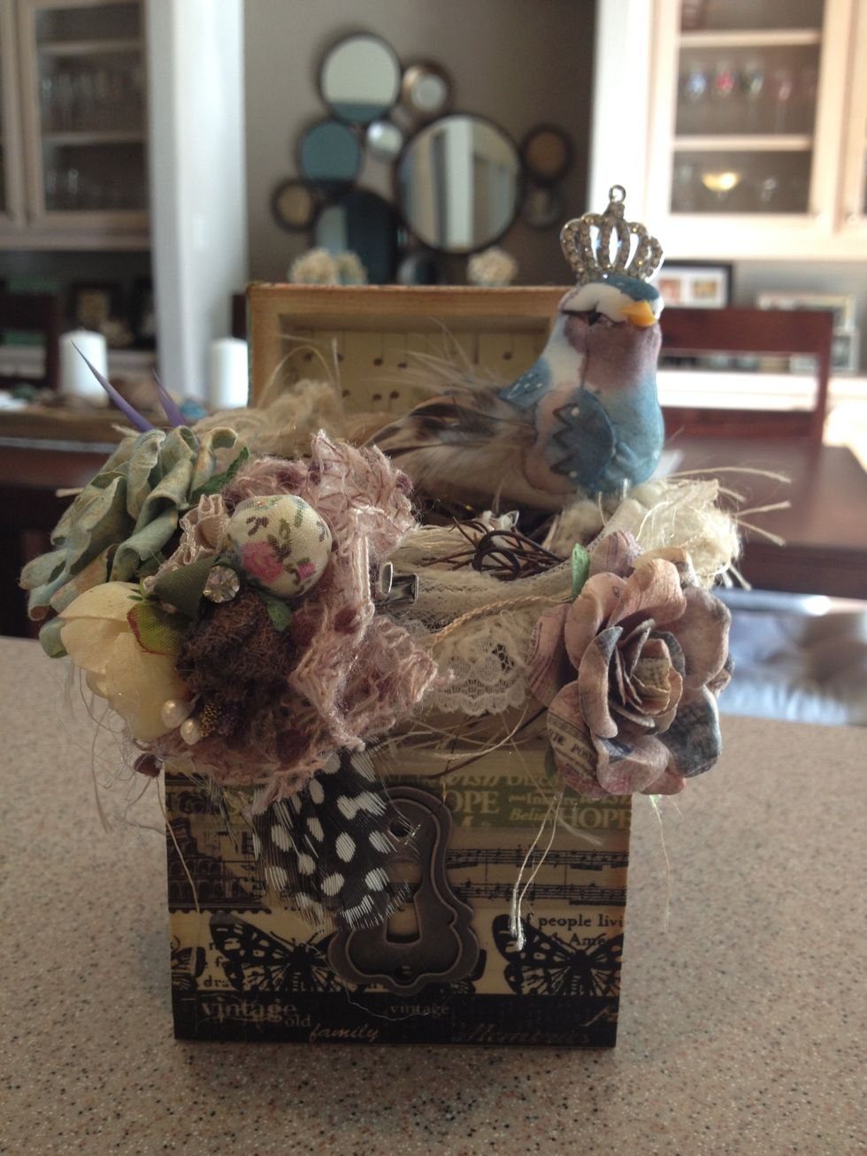 Go over the entire piece with Tim Holtz distress ink in vintage photo