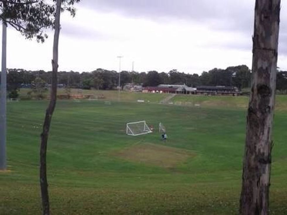Go to a oval and put the soccer ball on the grass where you won't hit anything by accident.