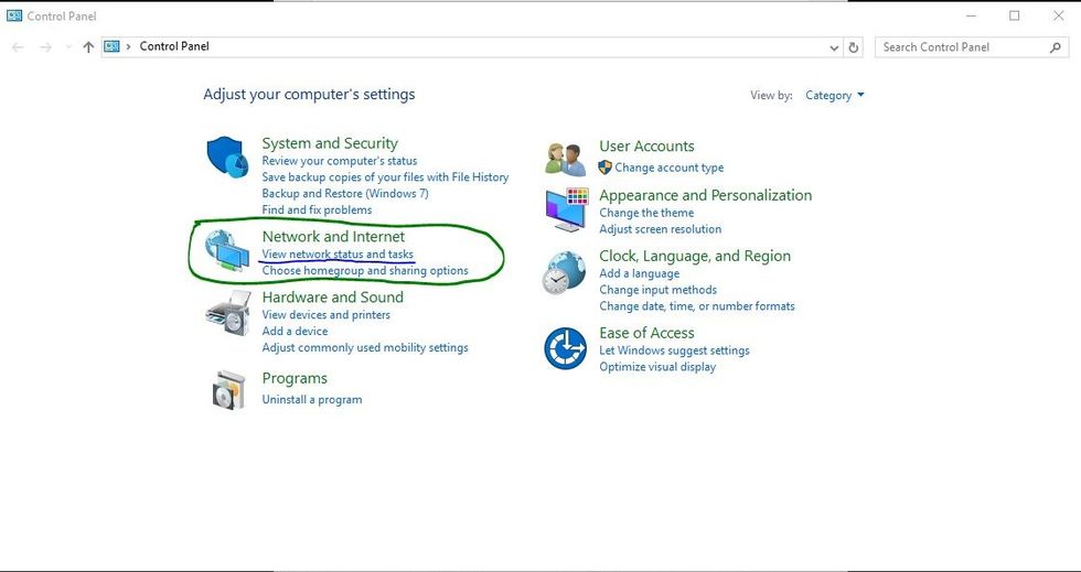 Go to Start > Control Panel to get to this menu. From here, click "View network status..." underlined in blue. This can be found in the section "Network and Internet," circled in green.