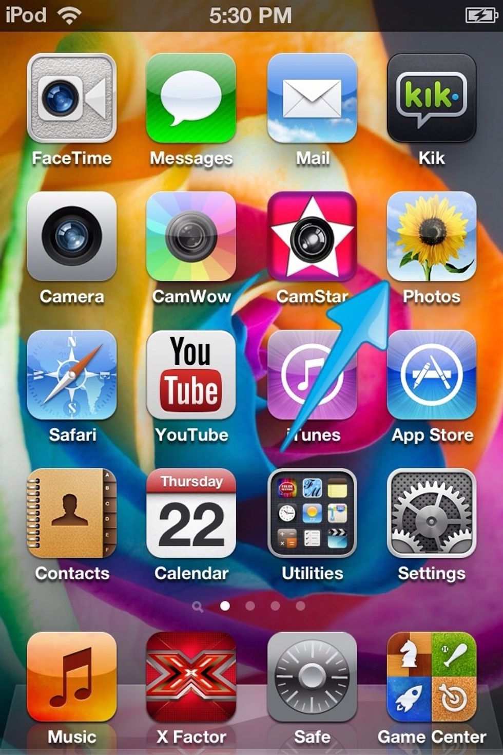 Go to your home screen and select 'Photos'.