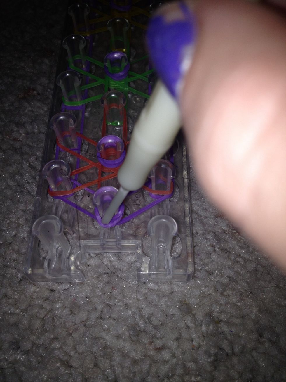 Go underneath the capping band and grab the orange