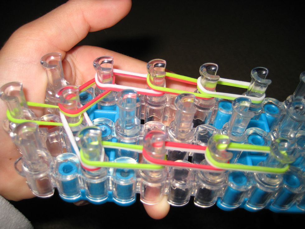 Go up on each side until you reach three. Do the right side first. Double the bands.