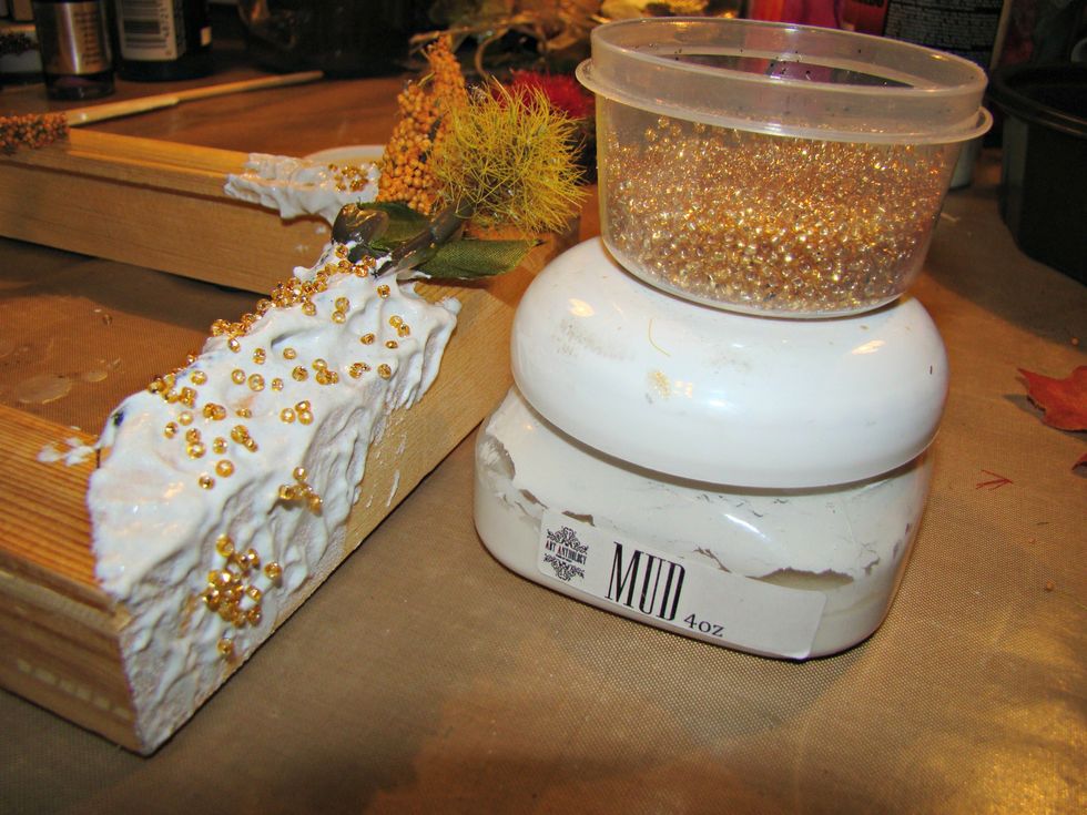 Gob on your Mud and sprinkle seed beads for added texture. Allow to dry.