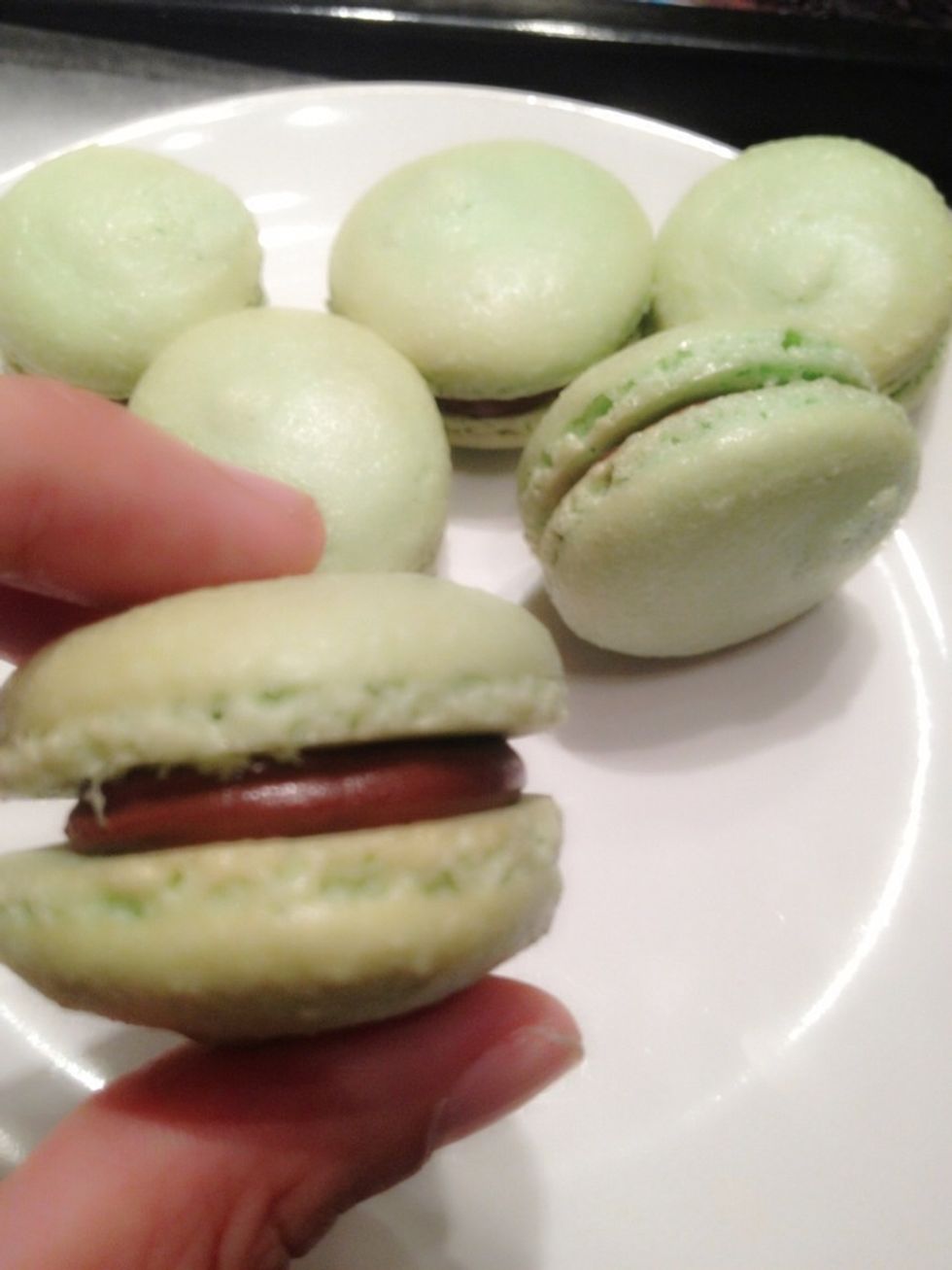 Good macarons should be able to stand on its side without loosing its fillings. You can keep this in air-tight container in the fridge for a good 5 days. (Better pipe filling on the serving day tho)