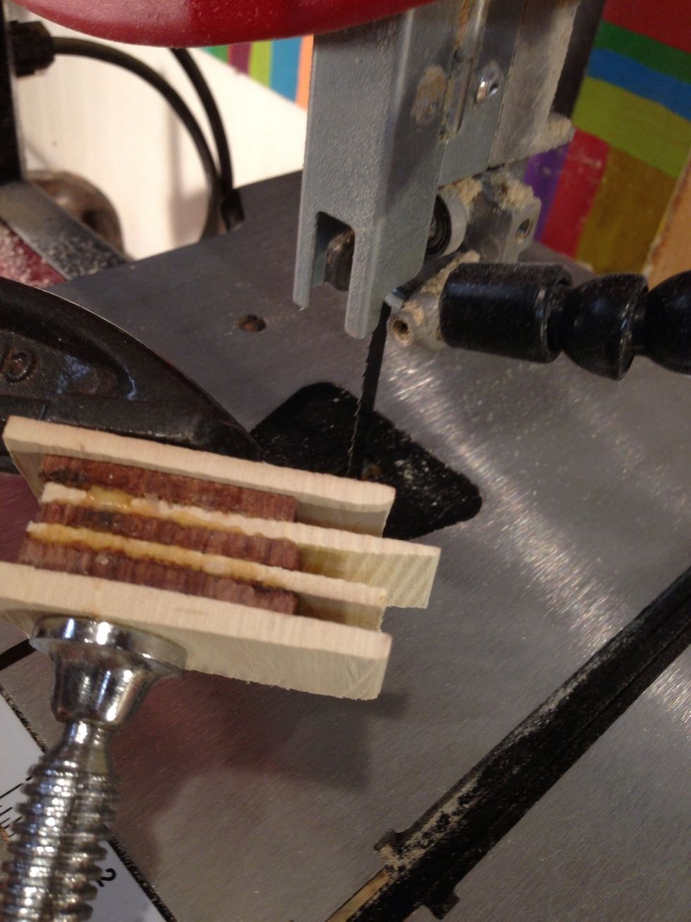 Got to your jig saw or you could cut with small saw. Keep safety in mind wear gloves eye protection and have good lighting so you can see clearly.