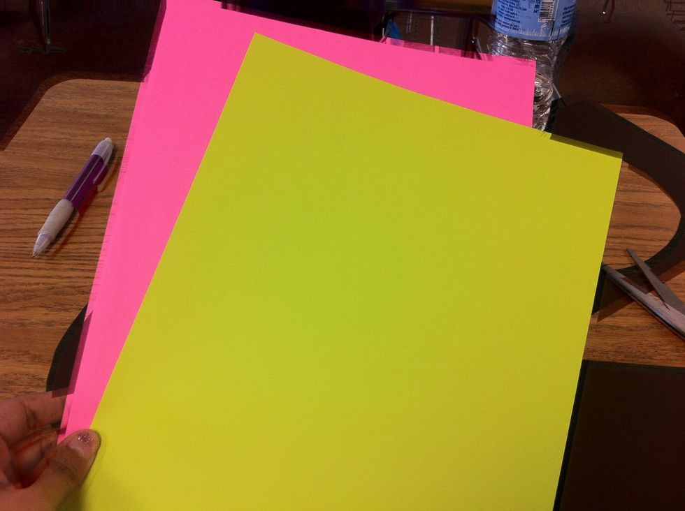 Grab 1 pink paper and 1 green paper.
