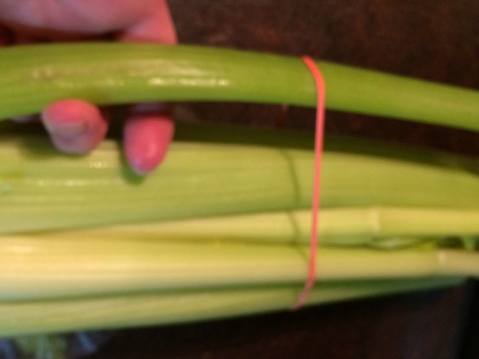 Grab 1 stalk of celery. A stalk or rib is each one. The whole group of stalks or ribs is called a head.