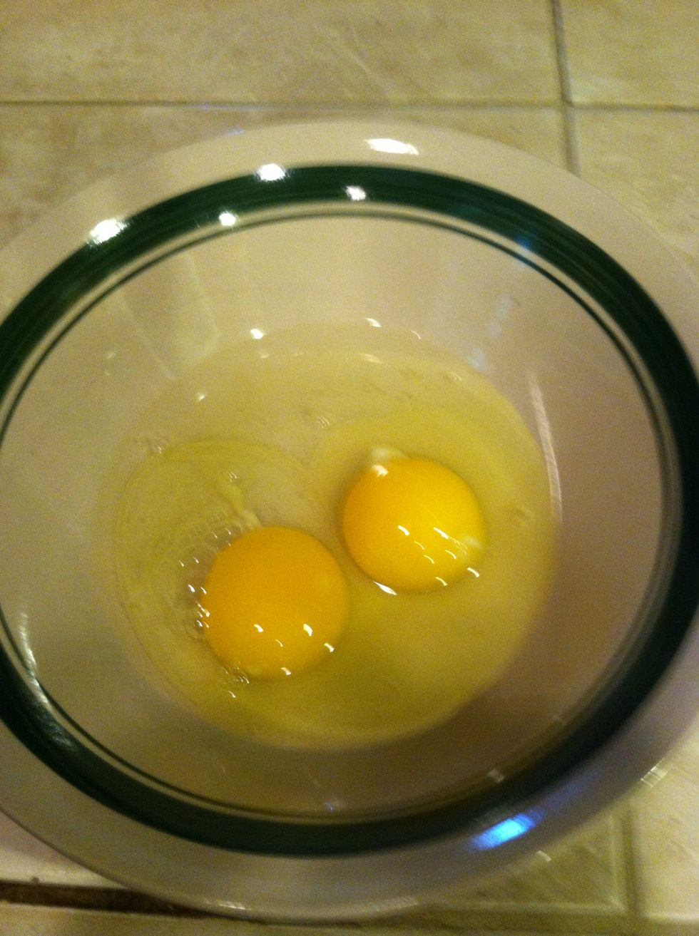 Grab 2 eggs , & put in a big bowl