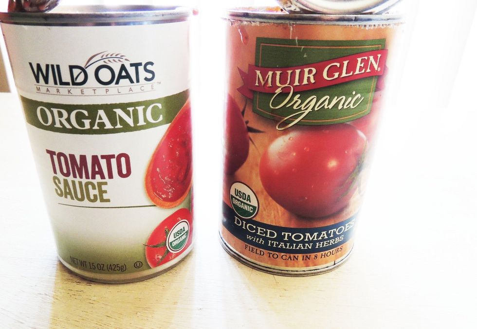 Grab a 14 oz can of diced tomatoes and a 15 oz can of tomato sauce. Add both to a large saucepan or wok type skillet. Add peppers and onions, cooked lentils, cooked quinoa and cooked black beans.