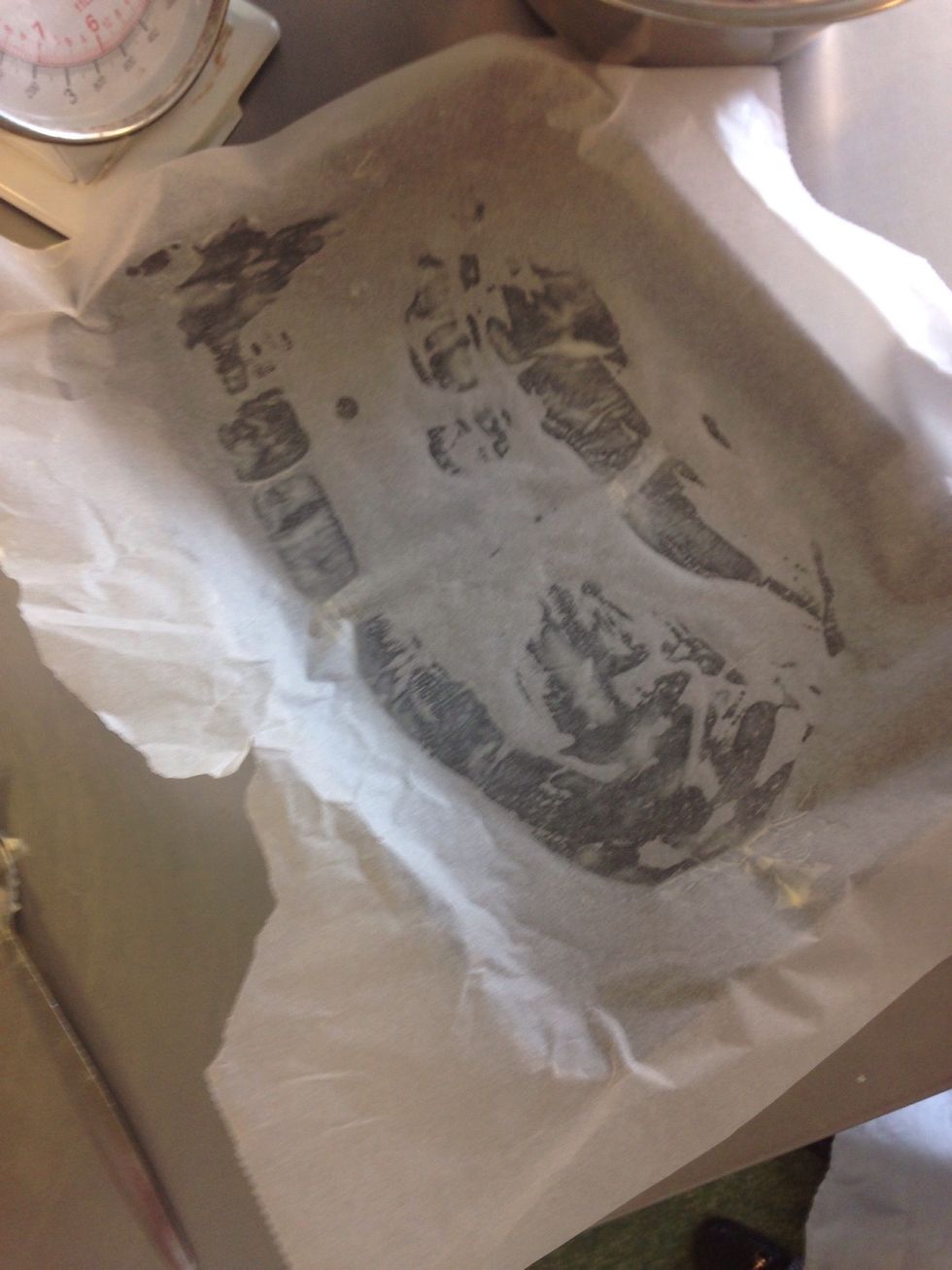 Grab a baking tray, a little bit of butter, then a medium sized bit of baking parchment