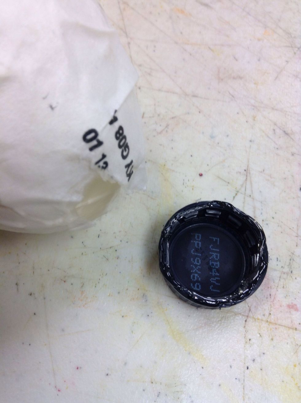 Grab a bottle cap (milk, soda, whatever) and hot glue that dude over the balloon hole. Might wanna help with this part depending on age or ability of your students, don't want burned digits!