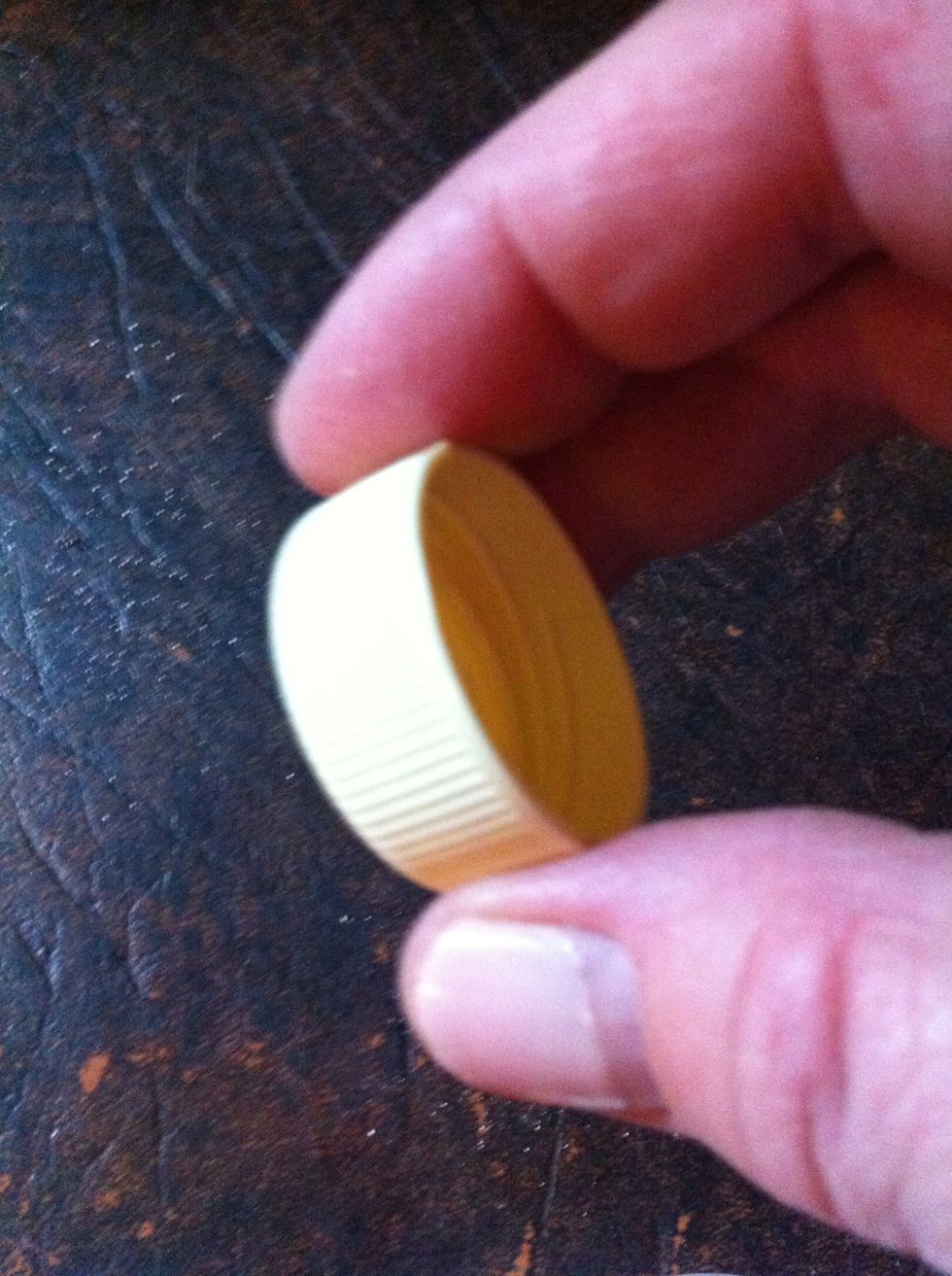 Grab a bottle top.. One that can be pitched.