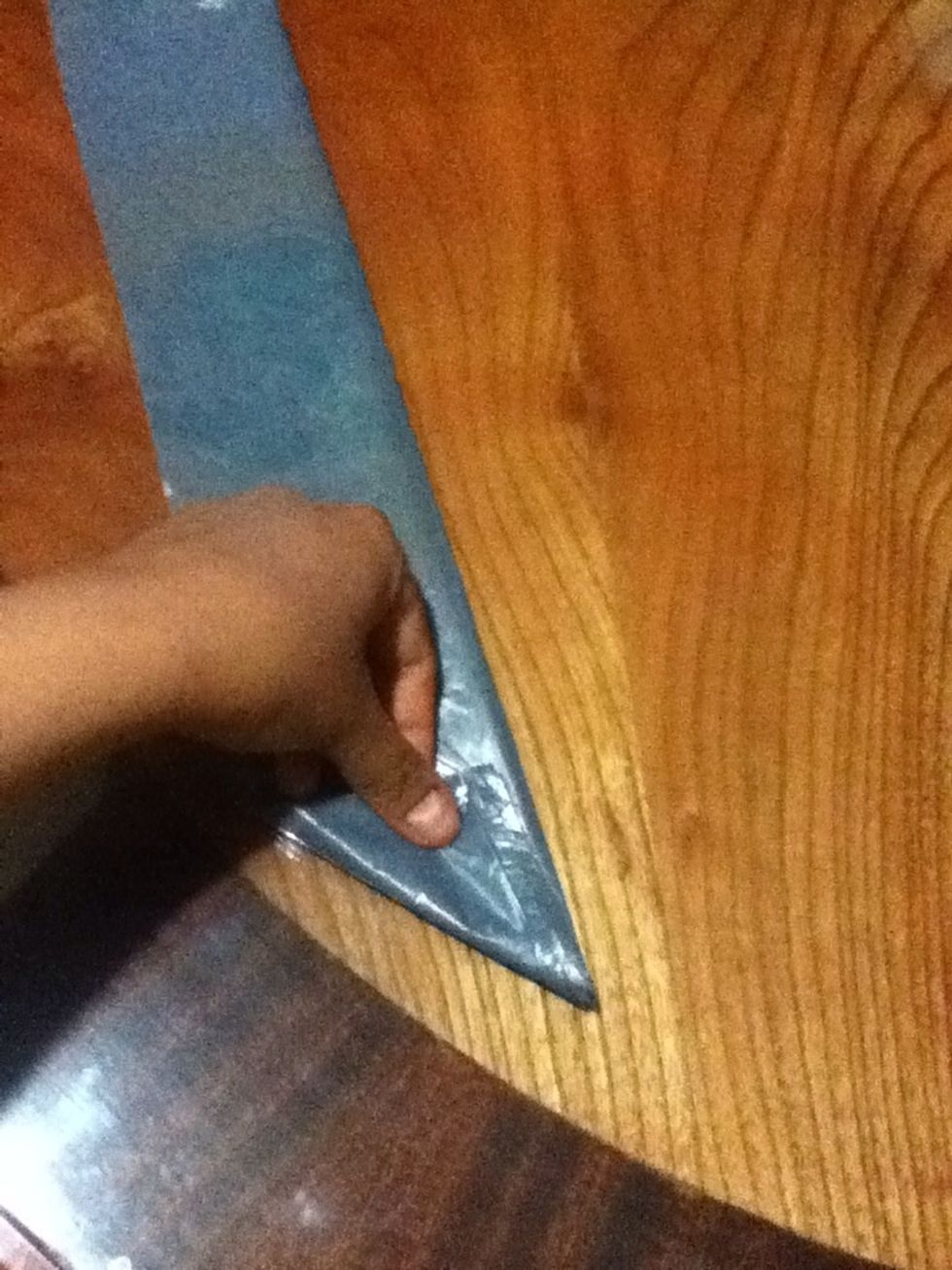 grab a corner and bend until it touches the other side of the bag