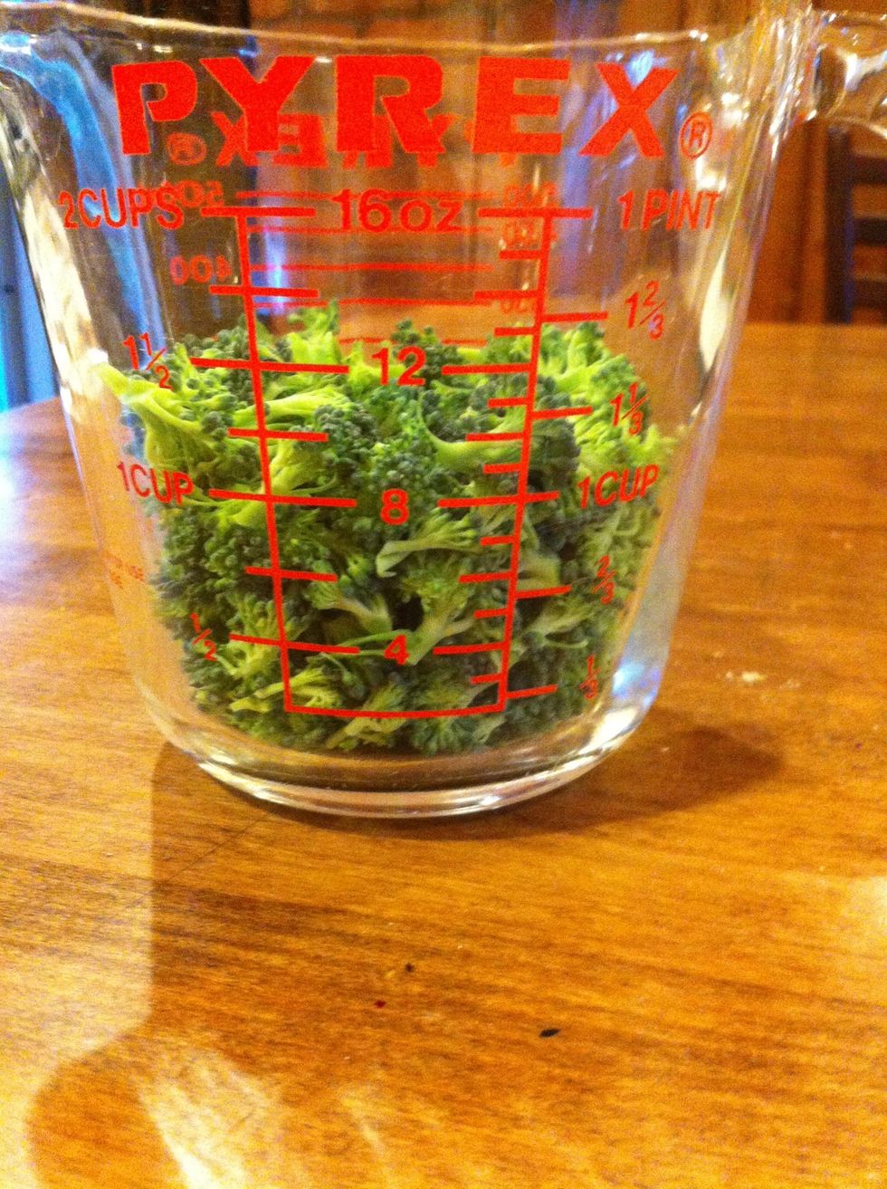 Grab a cutting board and chop up some broccoli florets into bite-size pieces. You can use as much as you like. I didn't use a whole lot though, nobody in my family are real big broccoli fans!!