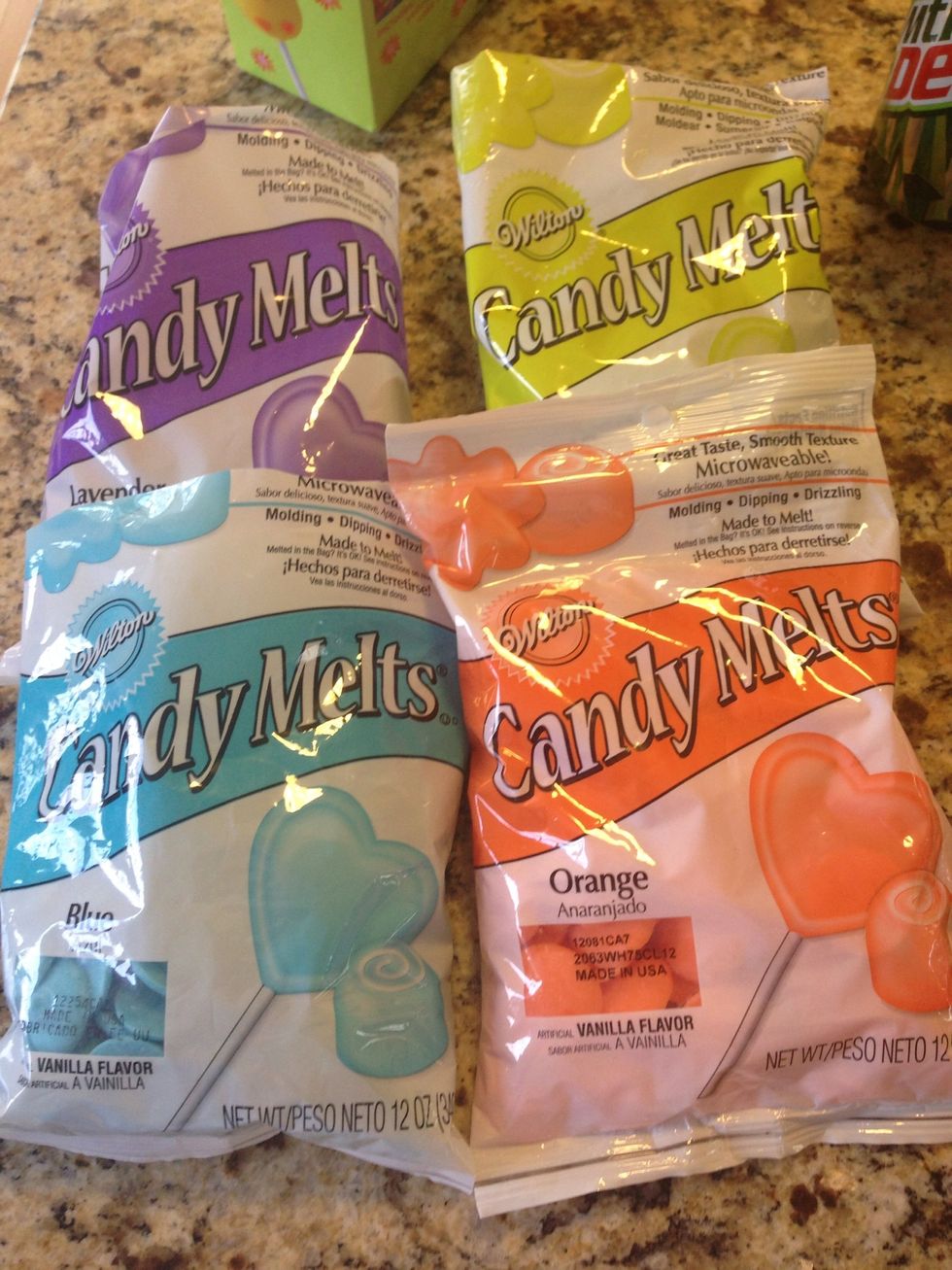 Grab a few bags of  Wilton Candy Melts at Michaels. My 3 year old chose these colors!