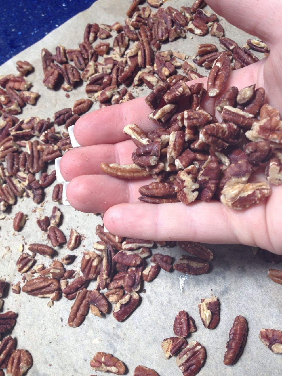 Grab a handful of your perfectly roasted pecans.