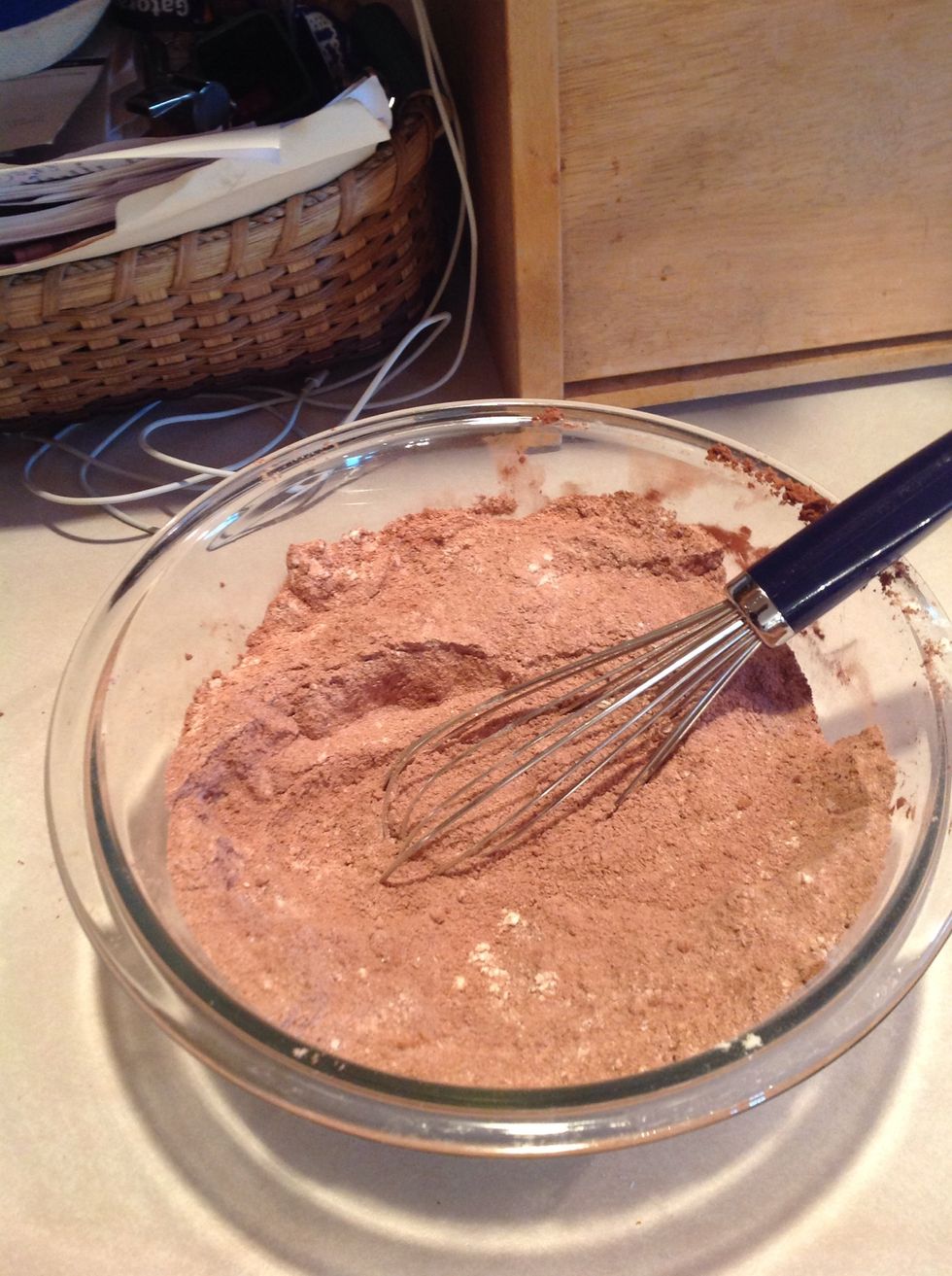 Grab a large bowl and stir together the dry ingredients. (Sugar, flour, cocoa, baking powder, baking soda, and salt)