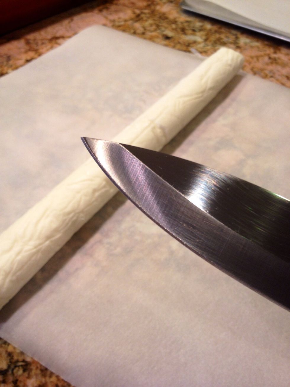 Grab a sharp knife and cut the log into thin slices.