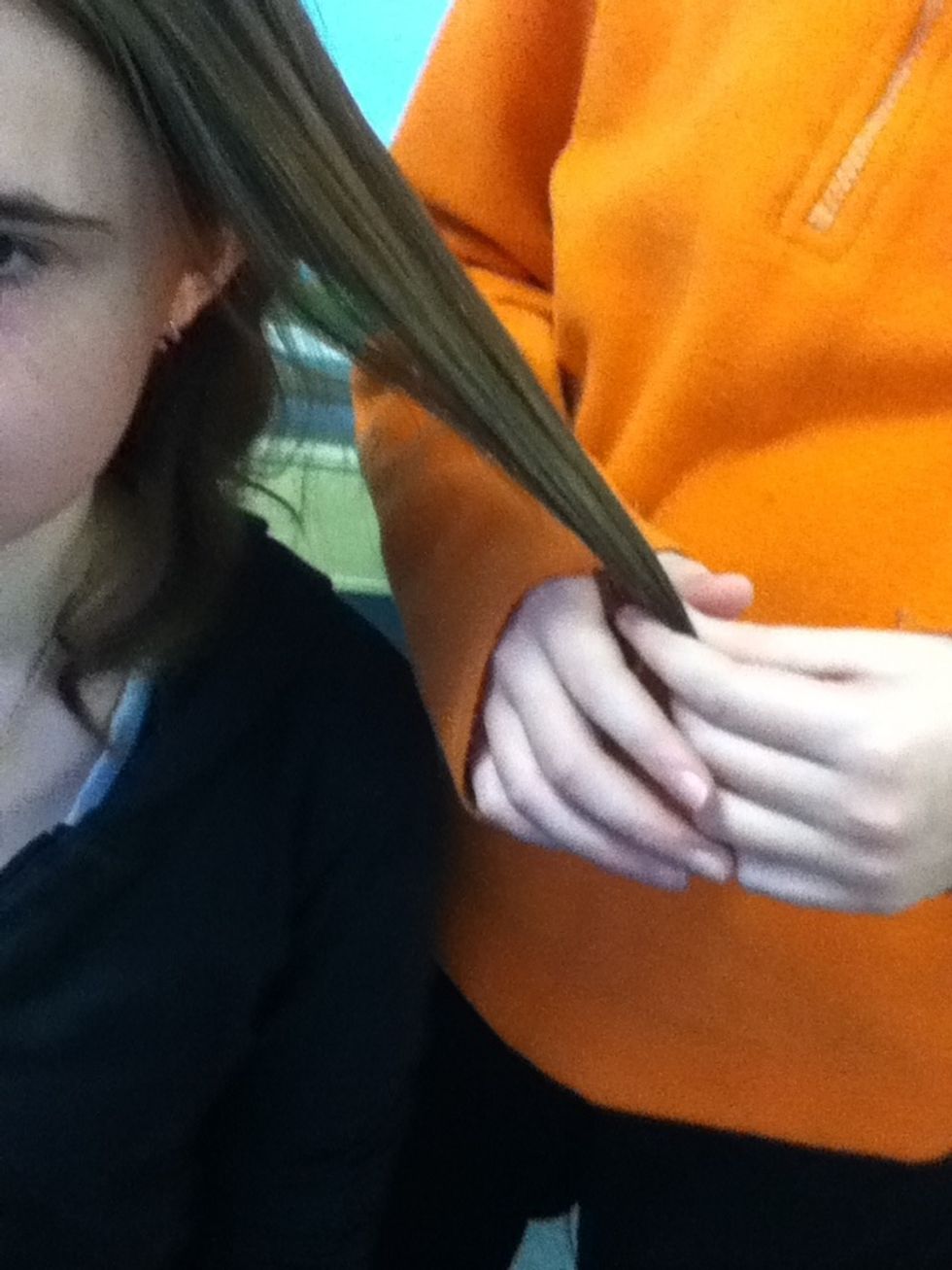 Grab a small part of your hair