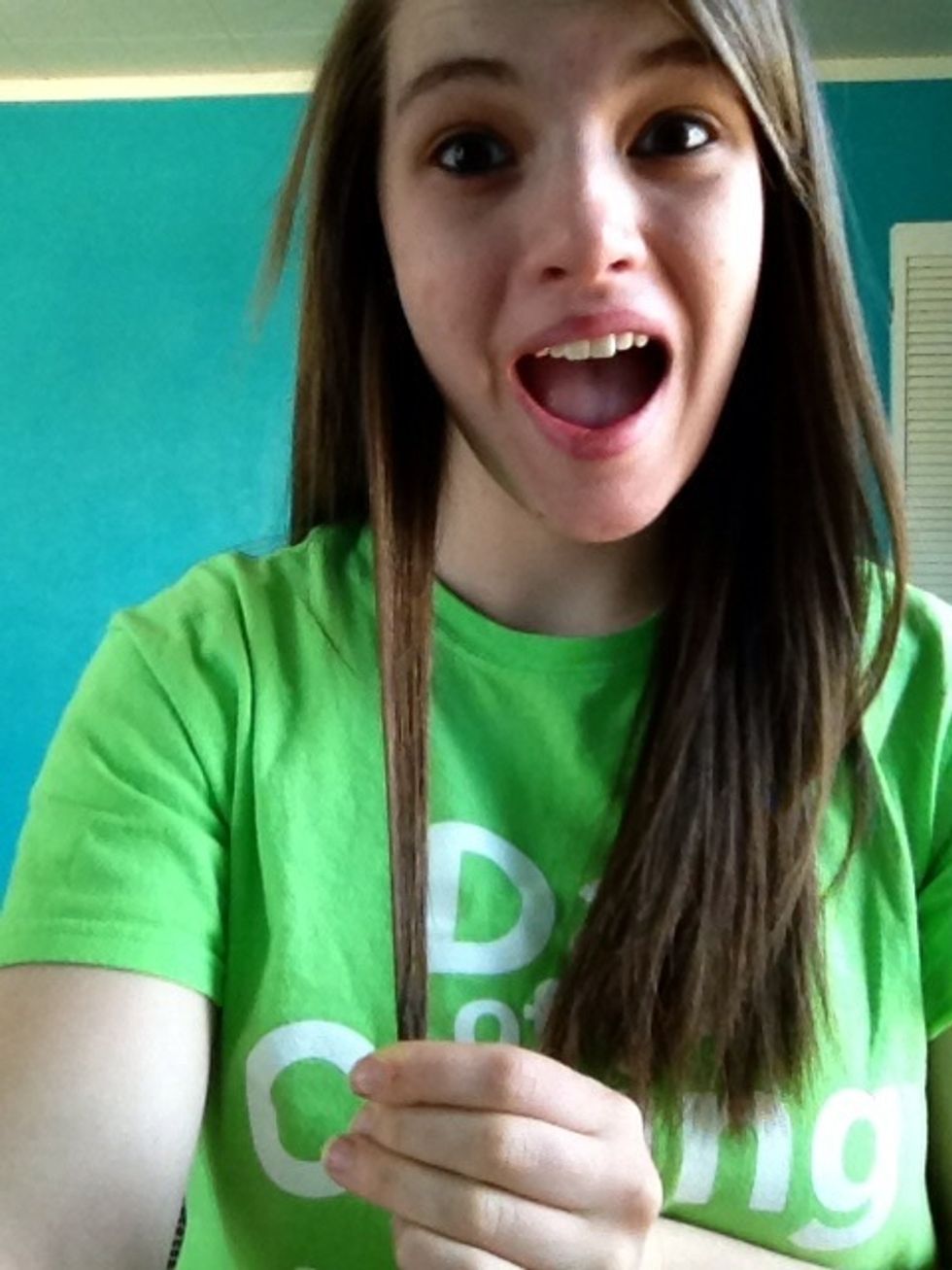 Grab a small piece of hair from one side.