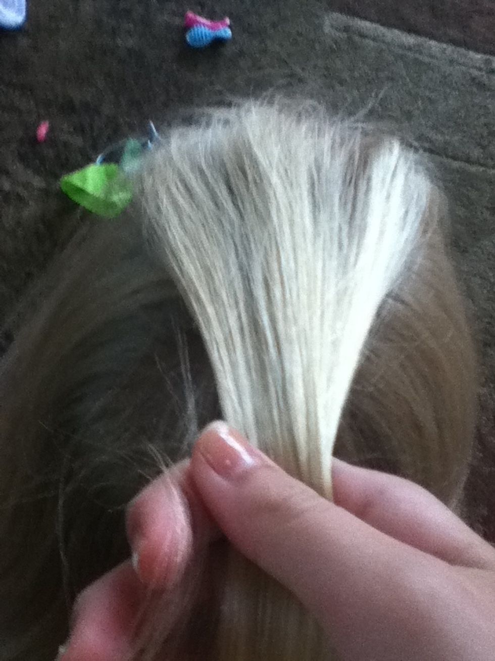 Grab about that amount of hair from the top of your head.
