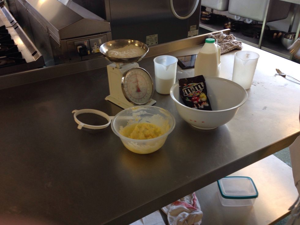 Grab all your ingredients: 1tbsp milk , 150g caster sugar, 100g m&m, 150g s r flour, 225g softened butter