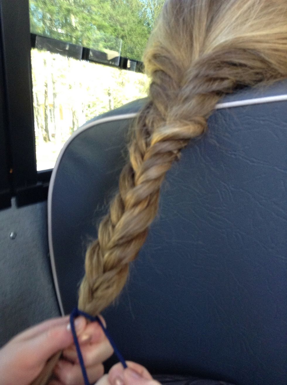 Grab an elastic and secure your fistail braid! That's it!