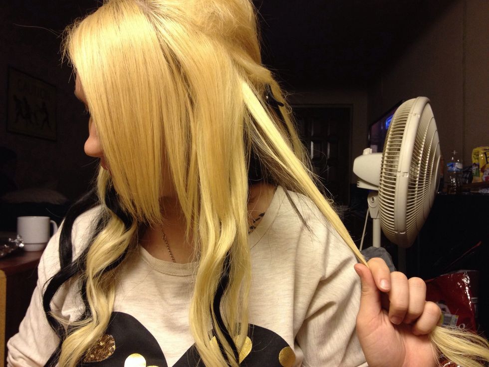 Grab an inch or 2 inch section of hair from the bottom part closet I your ear. (Thicker the hair the thicker the braid)