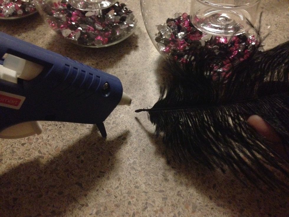 Grab another feather,repeat the last step, and stick it on the bottom of the jar.