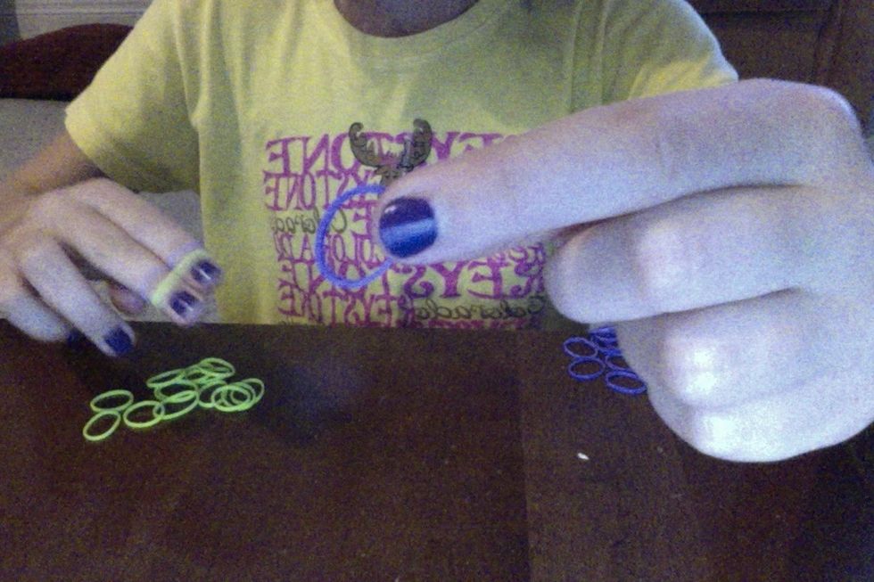 grab another purple rubber band and put it on top of you're green one