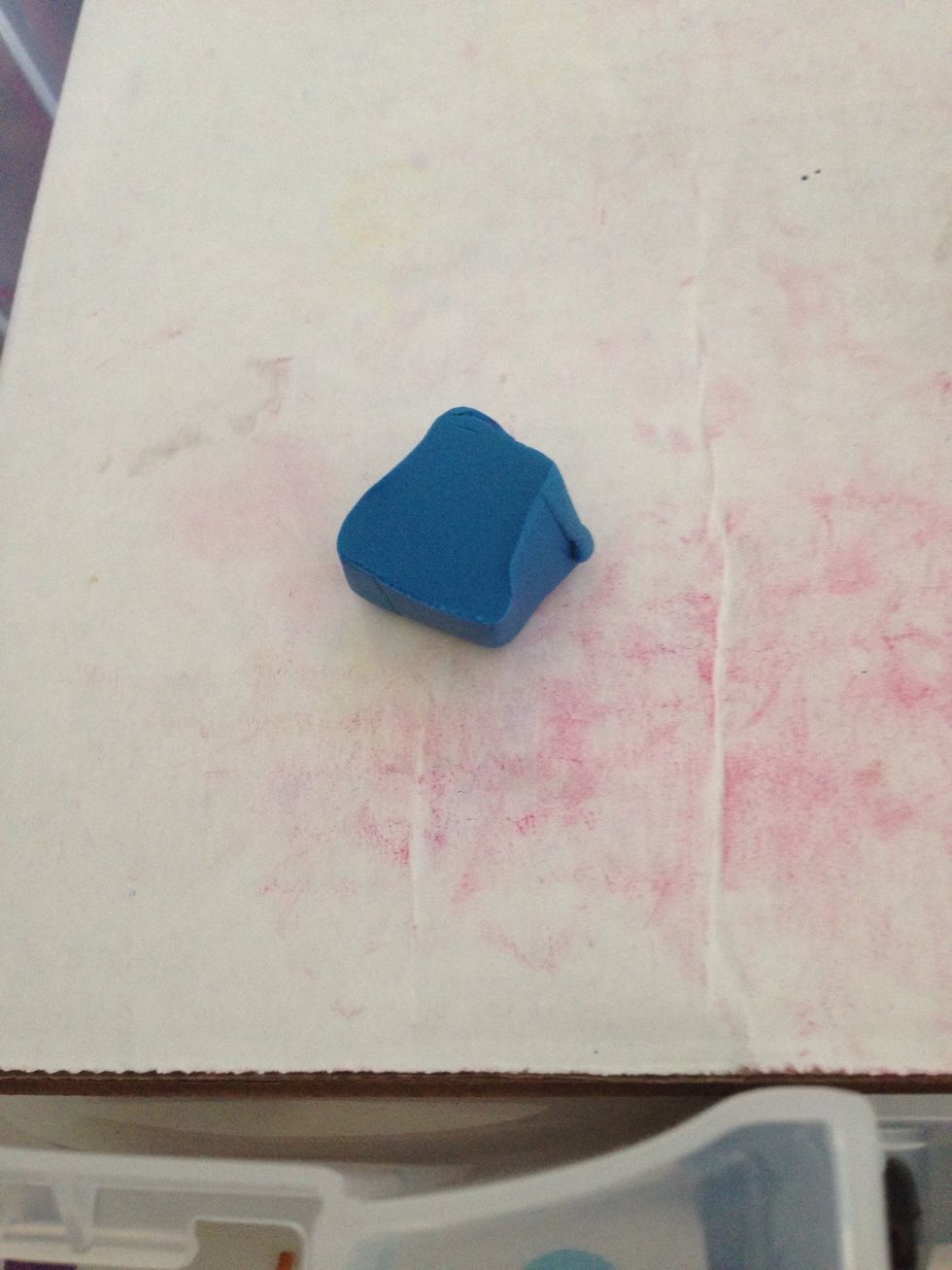 Grab another small piece of any diaries colour and be as artistic as possible and add shapes with the cutters. Be sure to add the ennitial of your moms first name so she knows that it's for her.