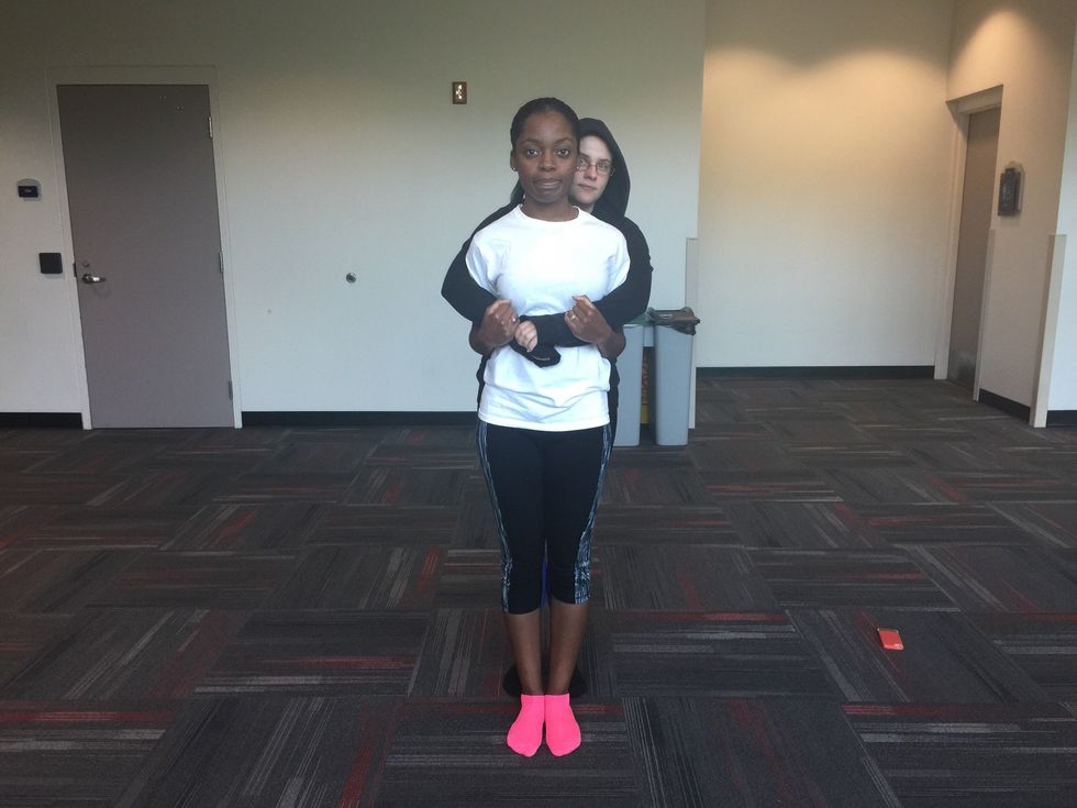 Grab assailant's arm