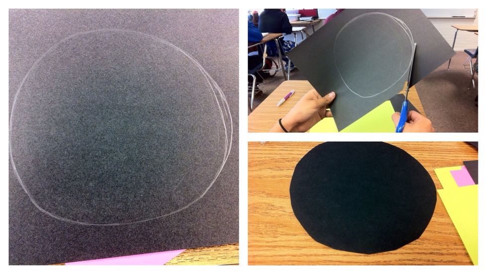 Grab black sheet of paper and draw your best circle, then cut it. You will be left with a full circle.
