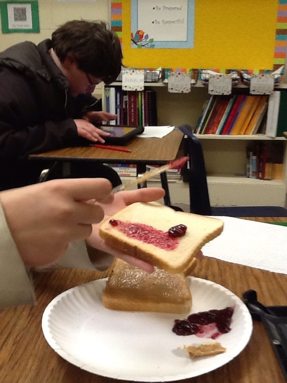Grab more jelly and place on bread.