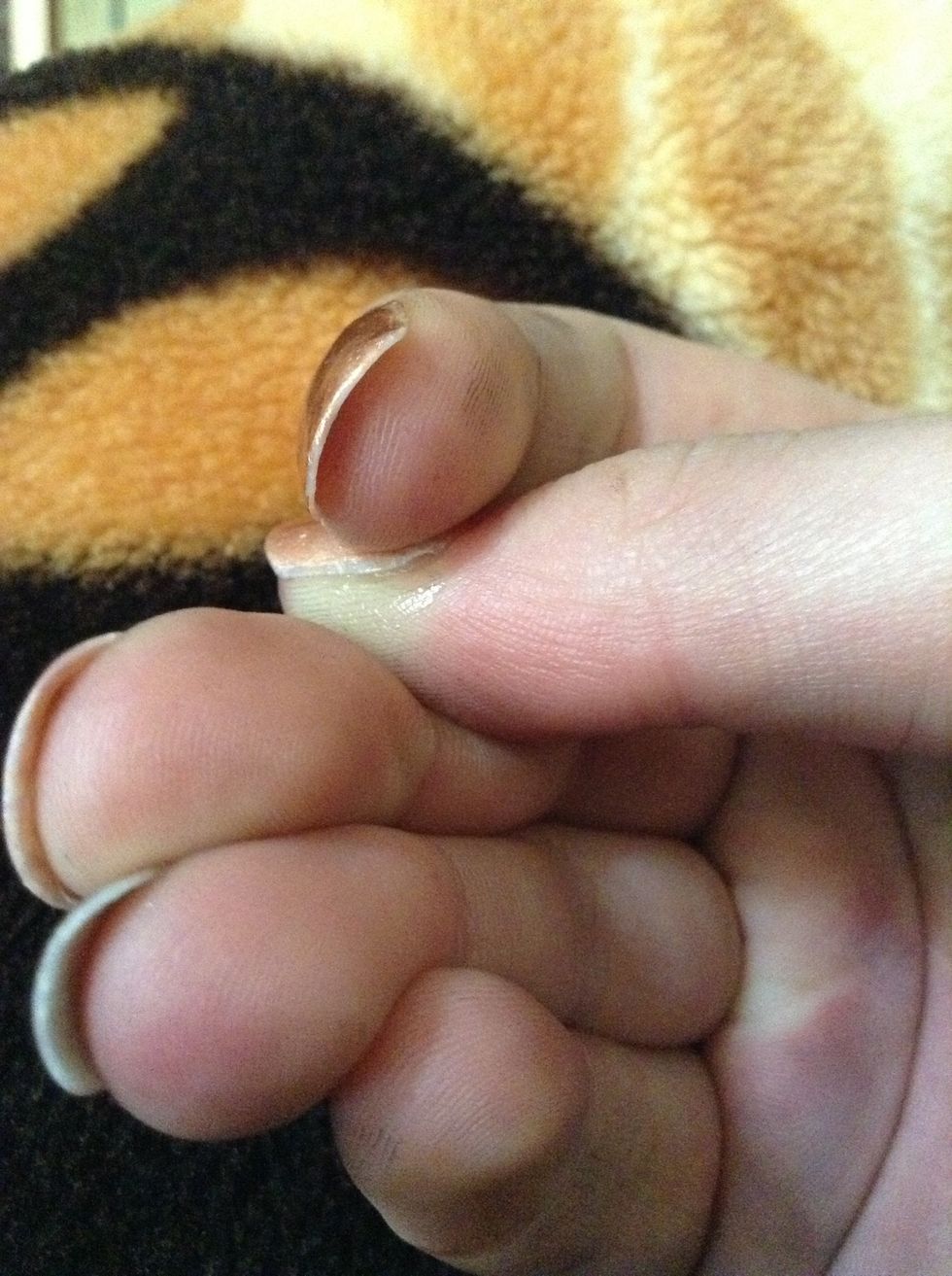 Grab nail and press down firmly so nail stays in place Hold this for about 20-45 seconds. It depends on how long the fake nail is and how long you want he nail to stay on