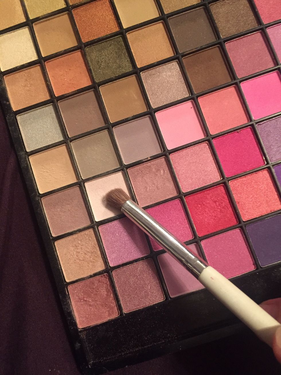 Grab one of your brushes and apply it with this color