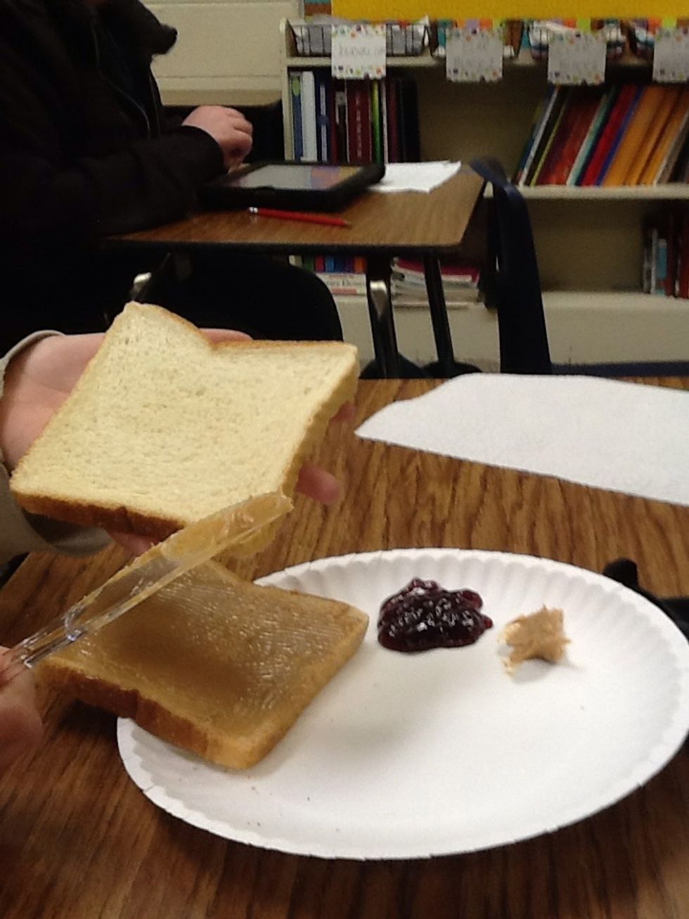 Grab other slice of bread, and butter knife.