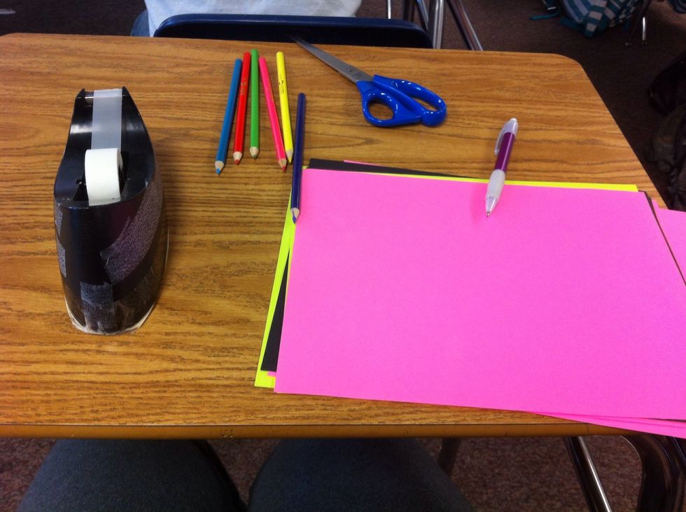 Grab paper, pencil, scissors, and tape.